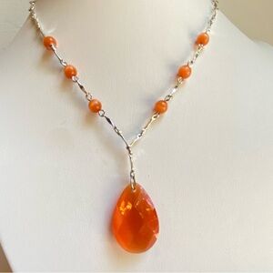 Avon NR orange cat’s eye glass pendant and bead necklace on silvertone bar chain